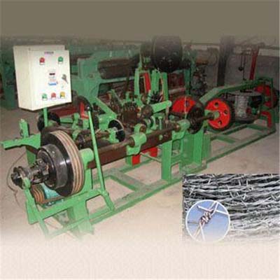 Automatic double twist barbed wire machine